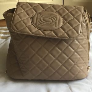 Bebe tan and gold backpack